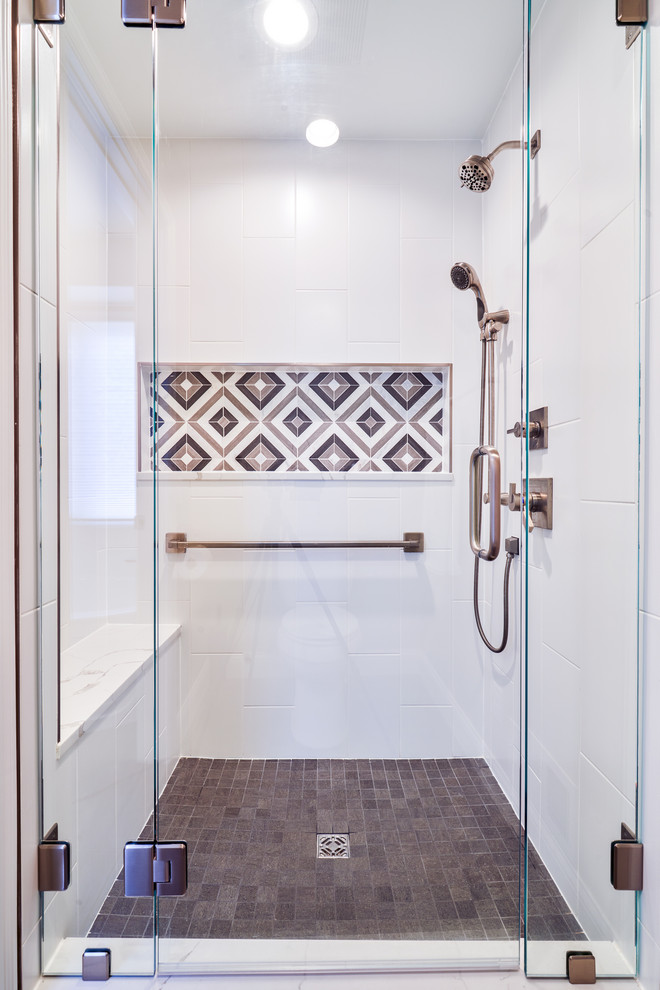 Design ideas for a mid-sized traditional master bathroom in Minneapolis with shaker cabinets, white cabinets, an alcove tub, an alcove shower, white tile, porcelain tile, grey walls, porcelain floors, an undermount sink, marble benchtops, grey floor, a hinged shower door and white benchtops.