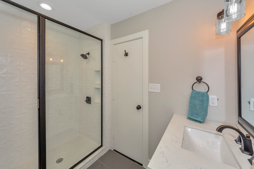 Photo of a small country master bathroom in Dallas with recessed-panel cabinets, white cabinets, an open shower, a two-piece toilet, white tile, ceramic tile, grey walls, marble floors, an undermount sink, quartzite benchtops, grey floor, a shower curtain and white benchtops.