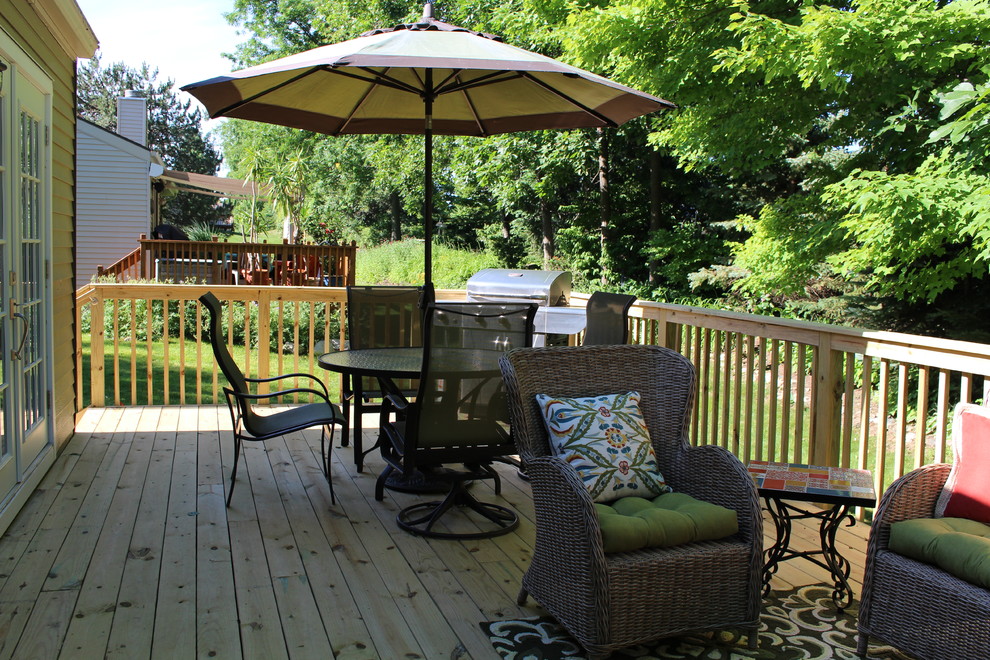 Deck - small transitional backyard deck idea in Detroit with no cover