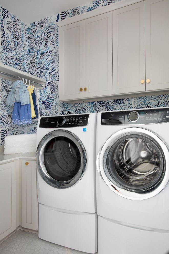 Photo of a beach style laundry room in Charleston.