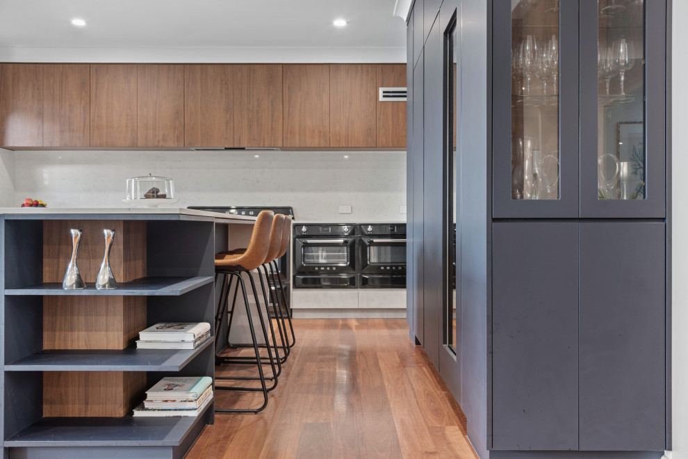 Photo of a contemporary kitchen in Brisbane with black appliances.