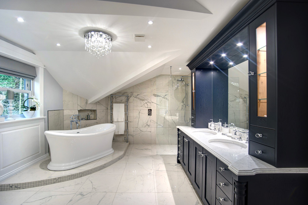 Design ideas for an expansive traditional master bathroom in Other with shaker cabinets, grey cabinets, a freestanding tub, an open shower, white tile, porcelain tile, white walls, porcelain floors, an undermount sink, quartzite benchtops, white floor and white benchtops.