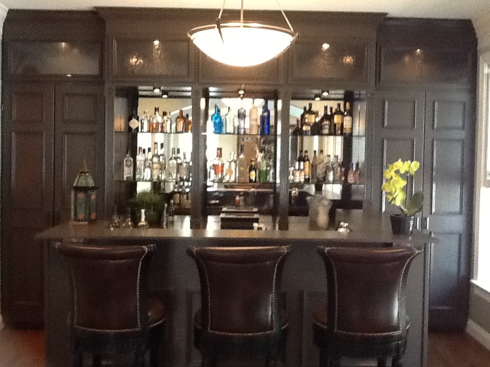 Photo of a large traditional home bar in DC Metro.