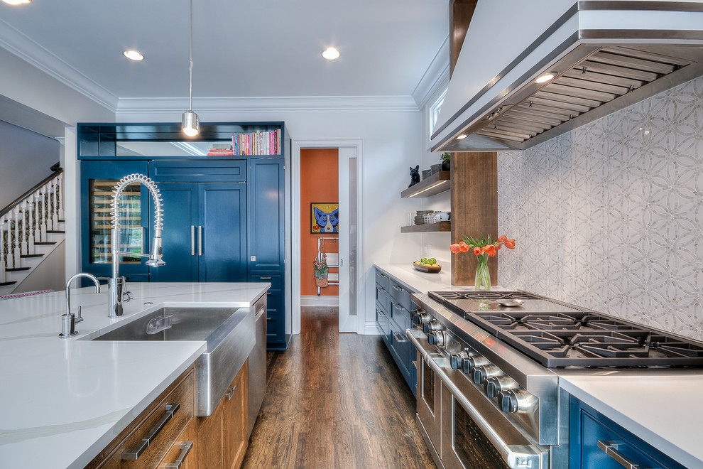 Example of a transitional kitchen design in Austin with white backsplash and stone tile backsplash