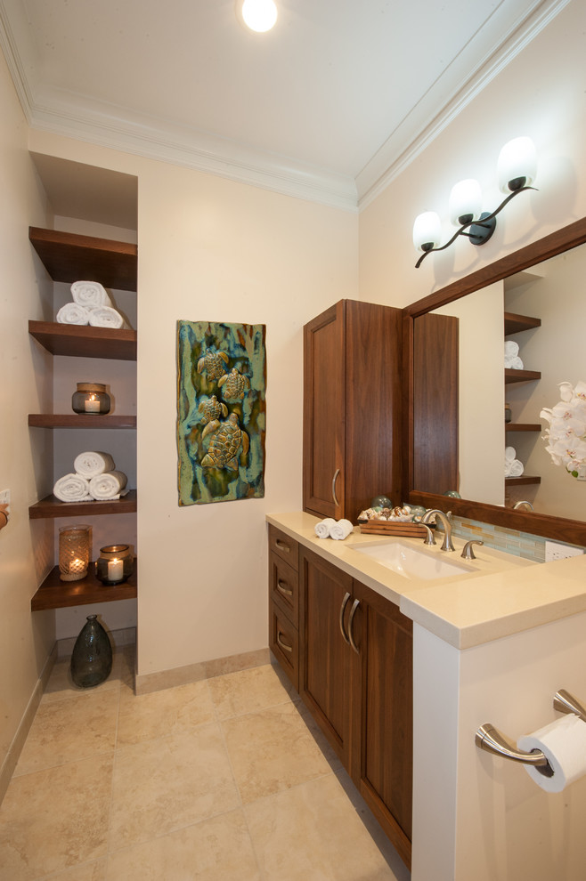 Mid-sized transitional bathroom in Hawaii with an undermount sink, shaker cabinets, medium wood cabinets, engineered quartz benchtops, multi-coloured tile, beige walls and porcelain floors.
