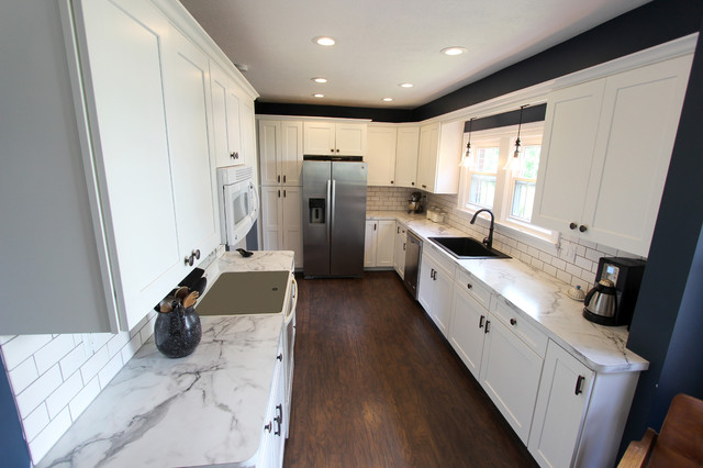 White Kitchen With Marble Look Laminate Countertop Akron Oh