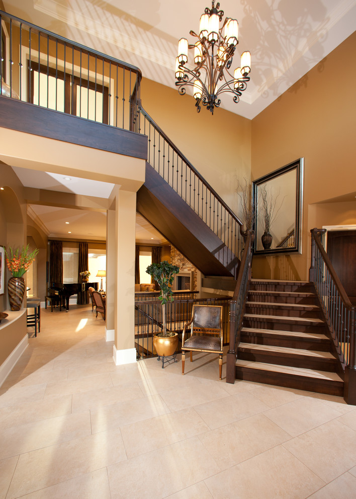 Inspiration for a mid-sized rustic porcelain tile and beige floor foyer remodel with beige walls