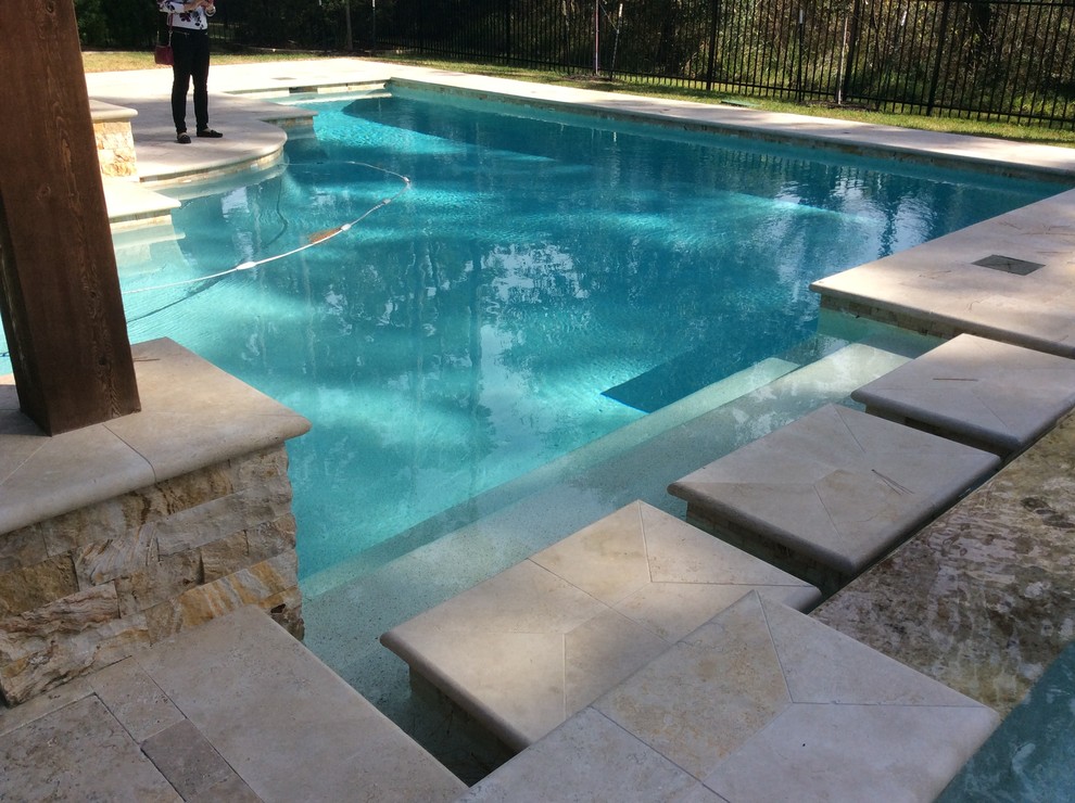 Transitional pool photo in Houston