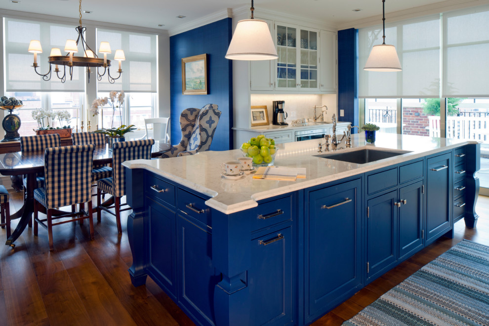 Example of a transitional dark wood floor and brown floor eat-in kitchen design in Baltimore with an undermount sink, recessed-panel cabinets, blue cabinets, quartzite countertops, beige backsplash, stainless steel appliances, an island and beige countertops