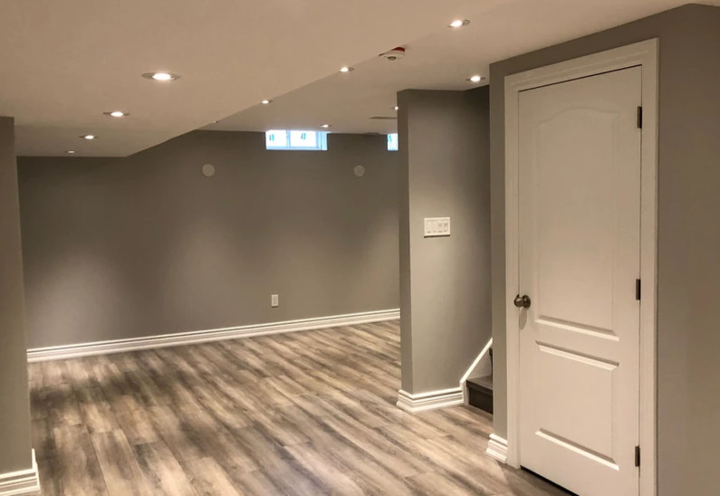Minimalist basement photo in Toronto