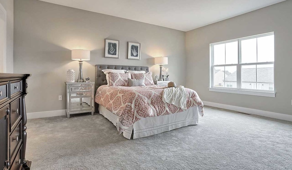 Design ideas for a large traditional master bedroom in Other with grey walls, carpet and beige floor.