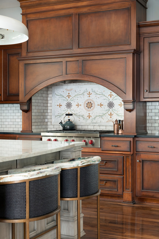 Design ideas for a medium sized traditional kitchen in Minneapolis with beaded cabinets, grey cabinets, marble worktops, white splashback, metro tiled splashback, medium hardwood flooring, an island, brown floors, white worktops and a coffered ceiling.