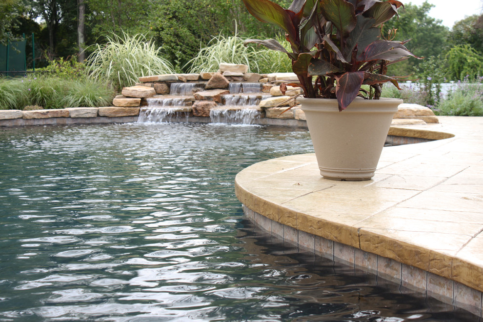Inspiration for a rustic pool remodel in Boston