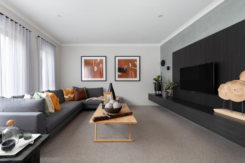 Contemporary enclosed living room in Other with a home bar, grey walls, carpet, a wall-mounted tv and grey floor.