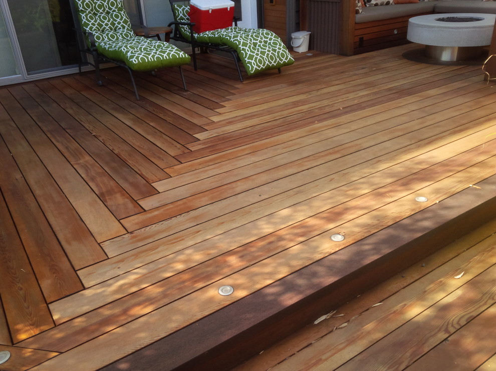 Home design - mid-sized transitional backyard home design idea in Vancouver with a fire pit and a pergola