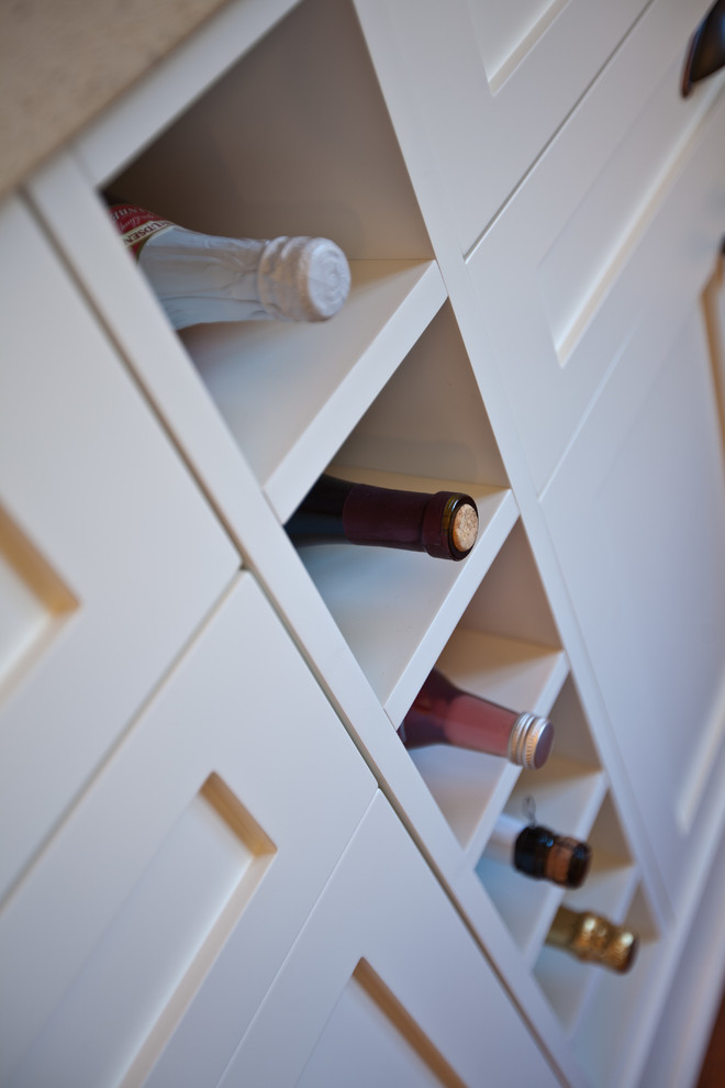 This is an example of a mid-sized modern wine cellar in Vancouver.