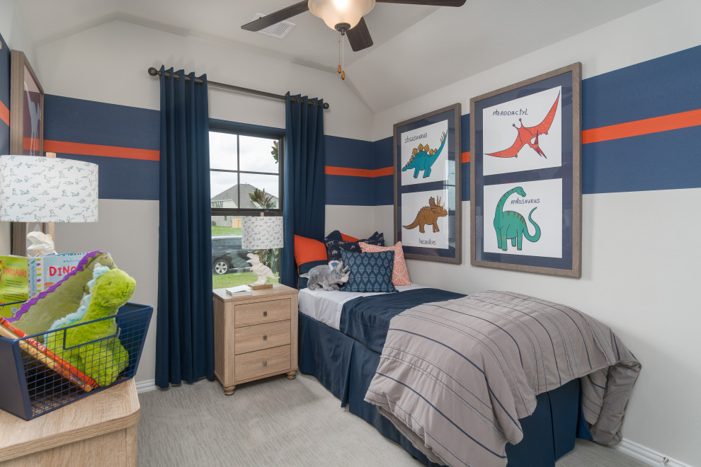 Mid-sized contemporary guest bedroom in Houston with blue walls, carpet and beige floor.
