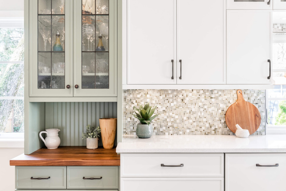 Eat-in kitchen - mid-sized transitional galley eat-in kitchen idea with shaker cabinets and an island