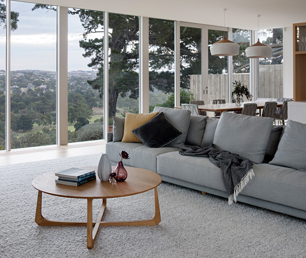 Design ideas for a contemporary living room in Melbourne.