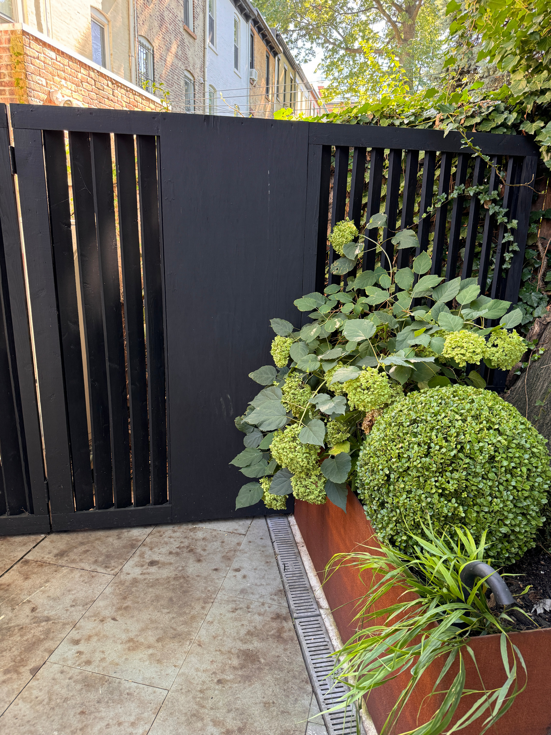 Park Slope backyard corten planters