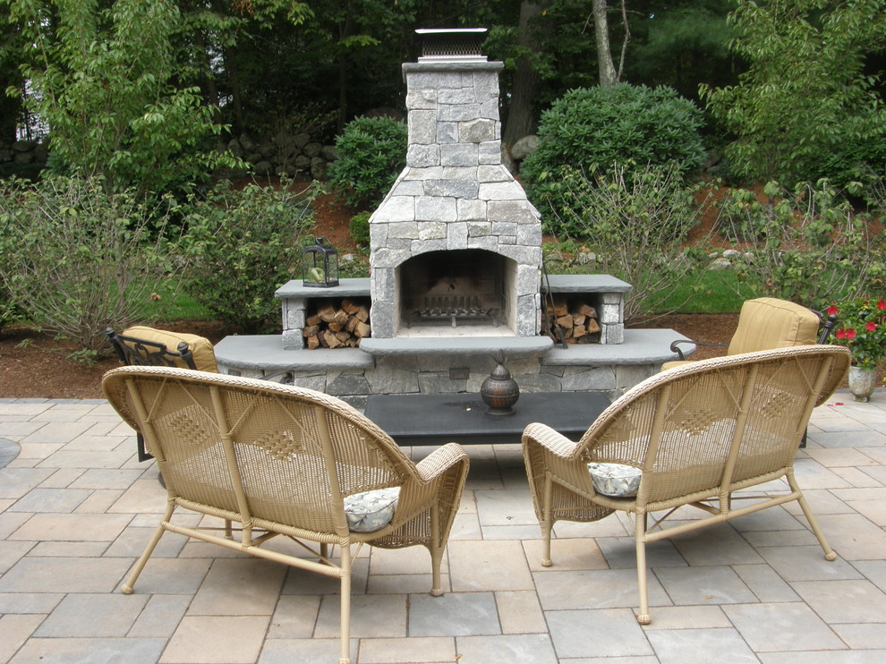 Design ideas for a traditional patio in Boston with a fire feature.