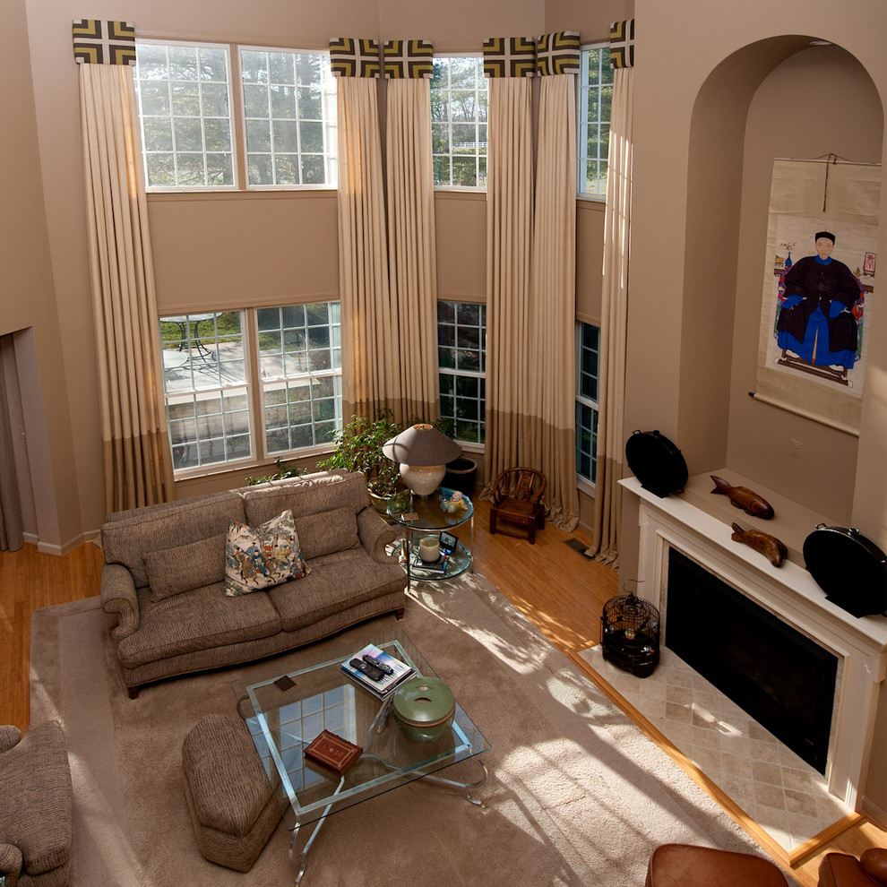 This is an example of an eclectic family room in DC Metro.