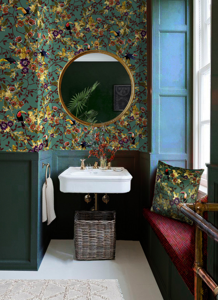 Photo of an eclectic powder room in London with green walls and wallpaper.