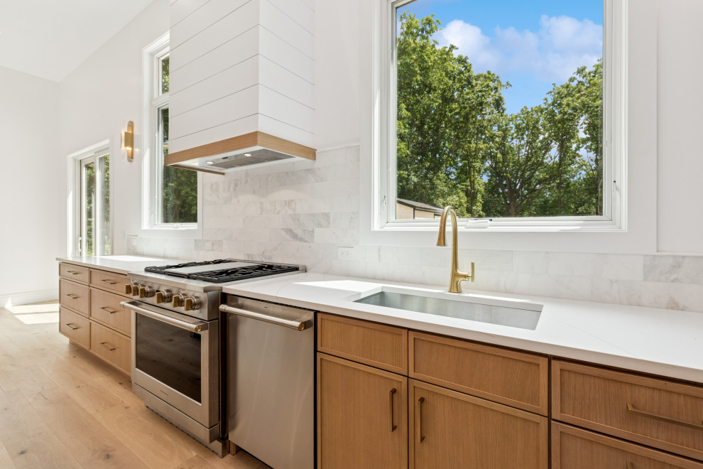 Sunlit Kitchen Wall with Shiplap Hood & Wide Windows