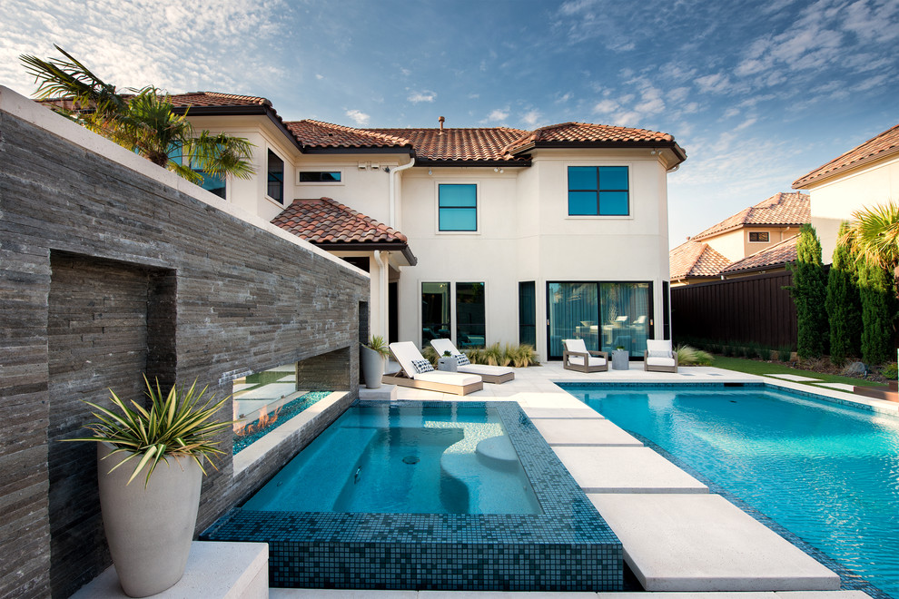 This is an example of an expansive modern rectangular pool in Dallas.
