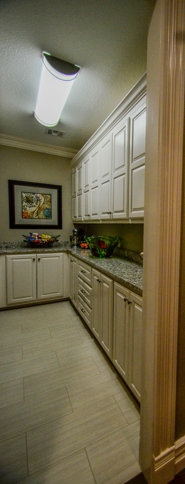 Inspiration for a large transitional u-shaped dark wood floor open concept kitchen remodel with a double-bowl sink, raised-panel cabinets, white cabinets, granite countertops, gray backsplash, stainless steel appliances and an island