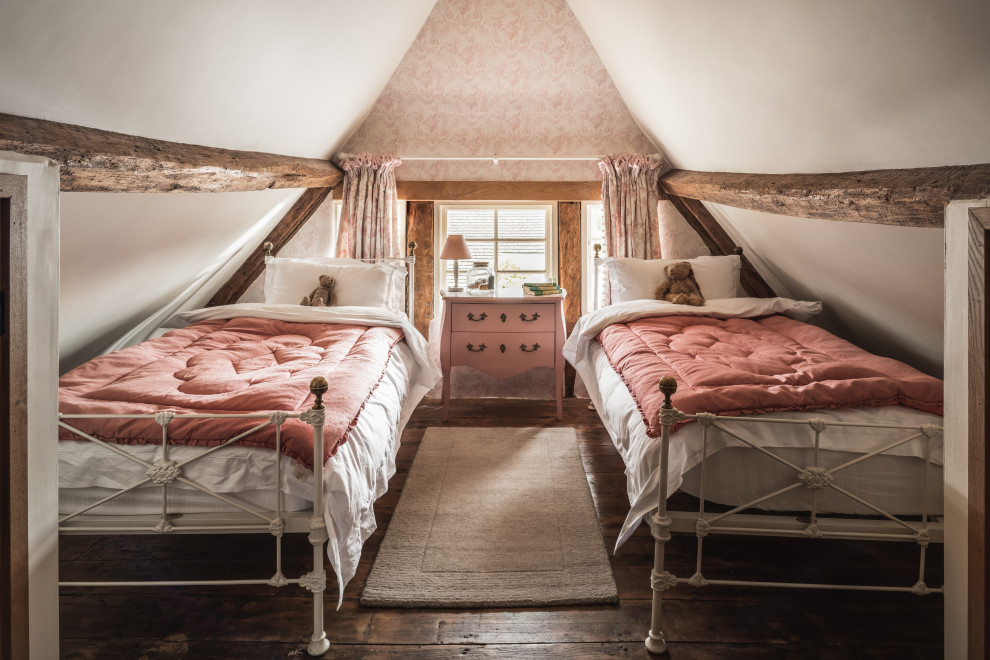 Photo of a medium sized vintage kids' bedroom in Oxfordshire with pink walls, dark hardwood flooring and brown floors.