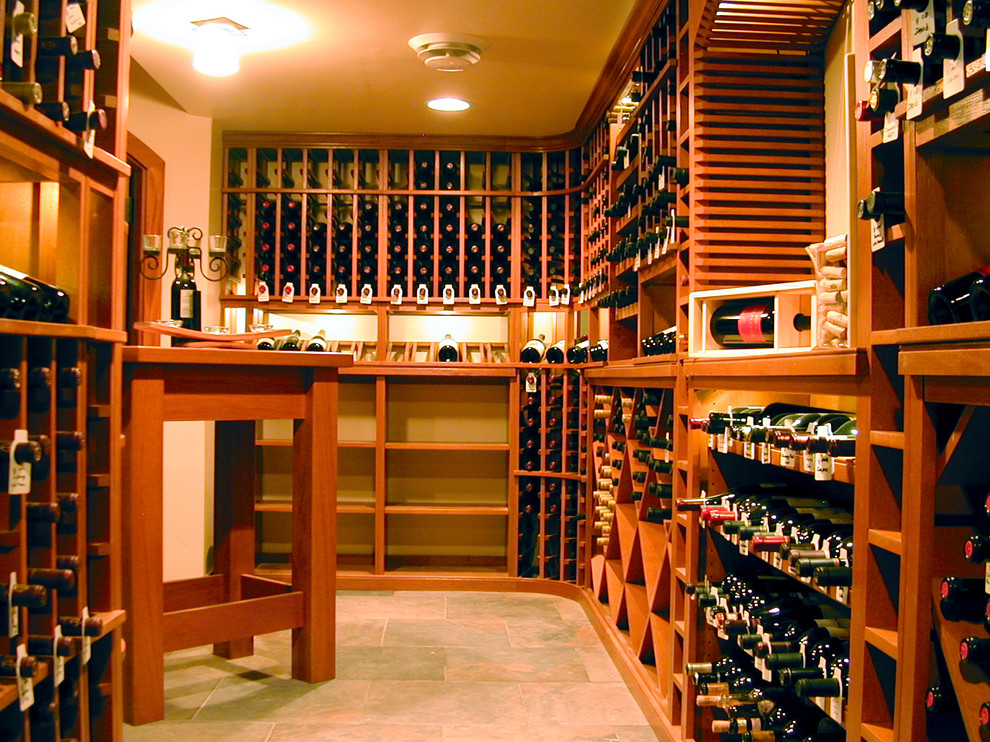 Example of a tuscan wine cellar design in Baltimore