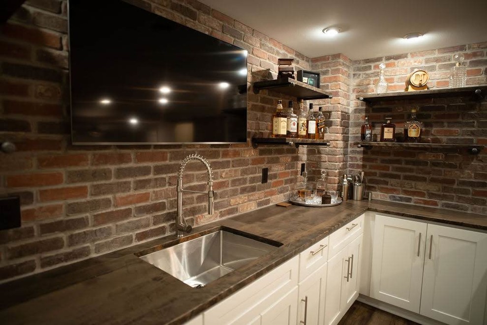 Inspiration for a rustic basement remodel in Milwaukee