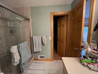 Primary Bathroom Expands to Add a Soaking Tub and a Larger Shower (7 photos)