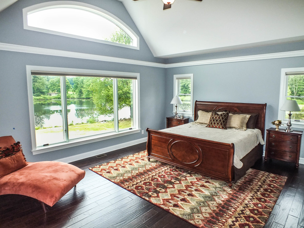 Photo of a country bedroom in Cleveland.