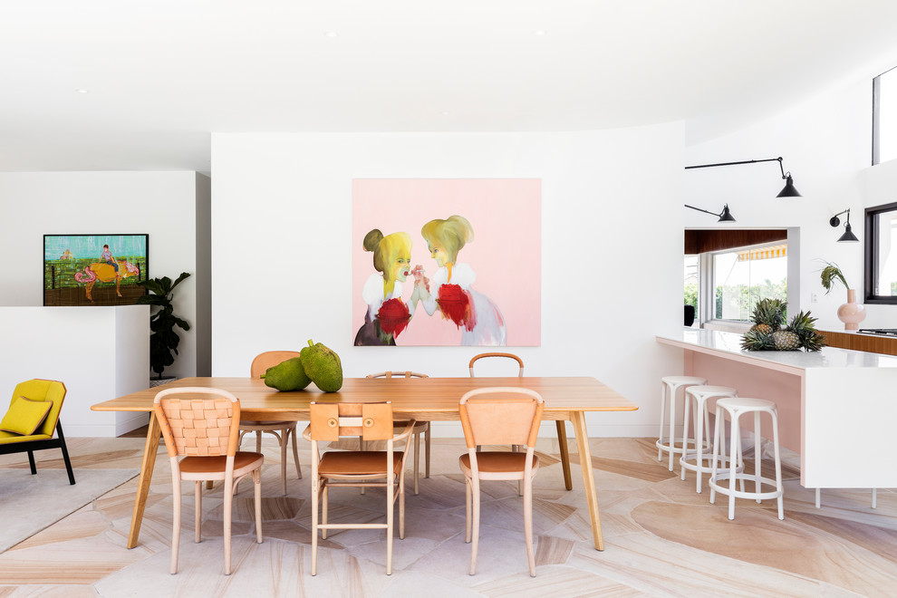 Midcentury open plan dining in Sydney with white walls.