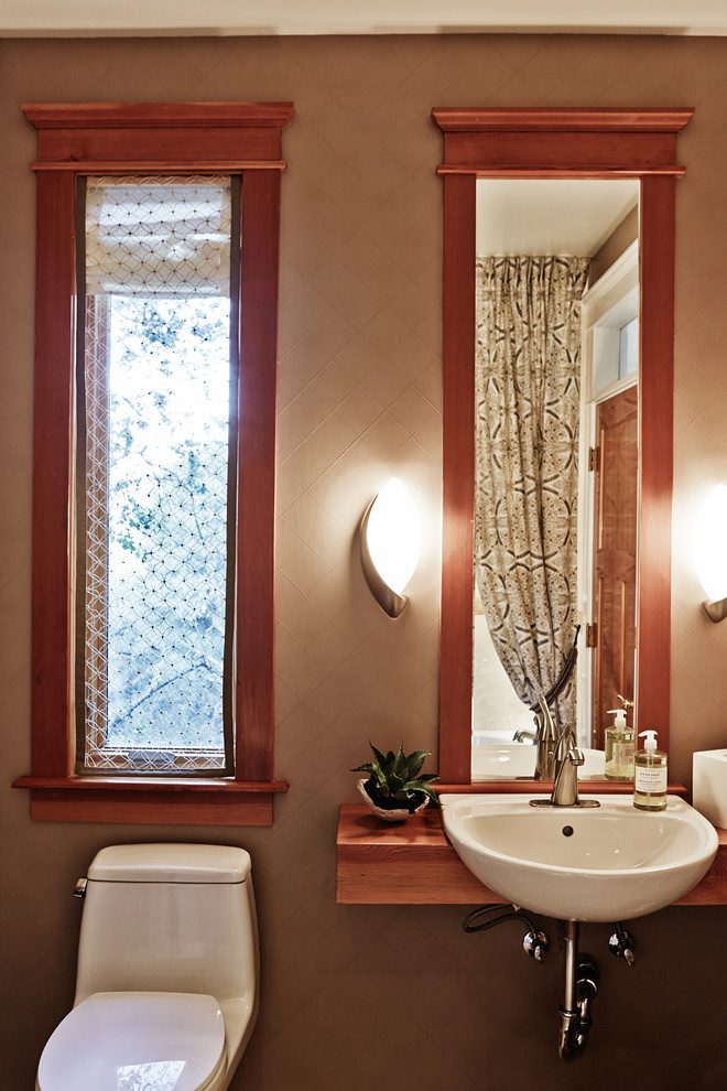 Mid-sized contemporary 3/4 bathroom in San Francisco with an undermount sink, furniture-like cabinets, light wood cabinets, marble benchtops, a corner tub, an open shower, beige tile, mosaic tile, beige walls and mosaic tile floors.