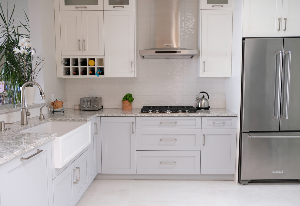 Example of a transitional kitchen design in Vancouver