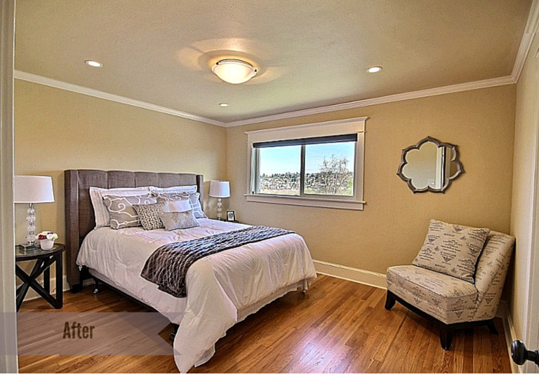 Inspiration for a small transitional master medium tone wood floor bedroom remodel in Seattle with beige walls and no fireplace