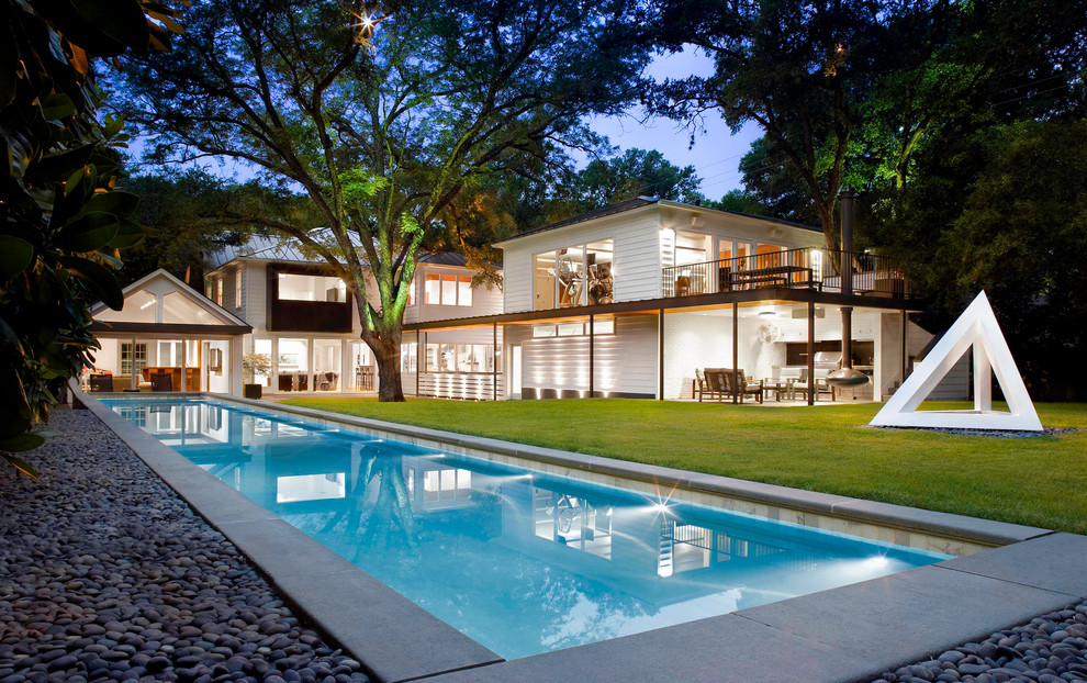 Inspiration for a transitional backyard rectangular lap pool in Austin.