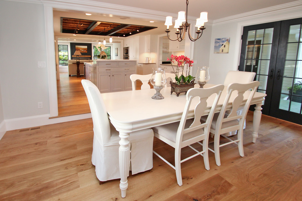 Design ideas for a large traditional open plan dining in Boston with grey walls, medium hardwood floors and brown floor.