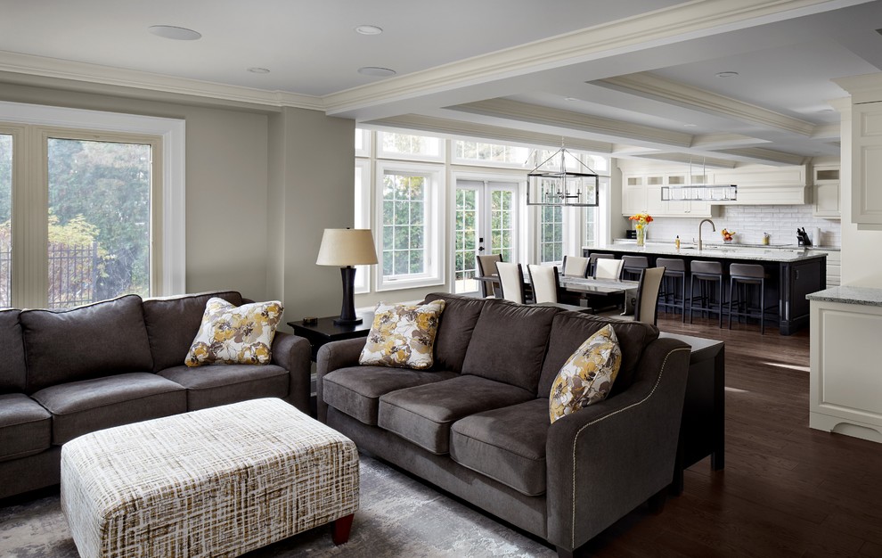 Inspiration for a transitional open concept family room in Toronto with grey walls, dark hardwood floors, brown floor and coffered.