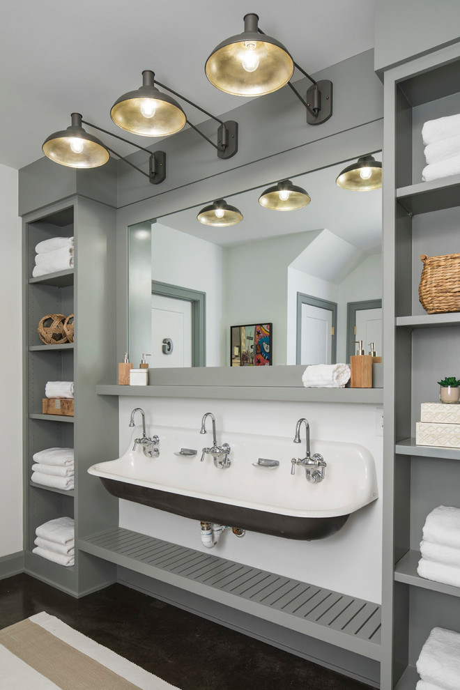 Inspiration for a large beach style kids bathroom in Minneapolis with open cabinets, grey cabinets, white walls, a trough sink, concrete floors, a curbless shower, a two-piece toilet, wood benchtops, grey floor and a hinged shower door.