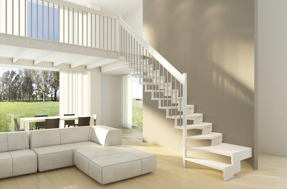 Design ideas for a mid-sized contemporary painted wood floating staircase in Miami with open risers and metal railing.