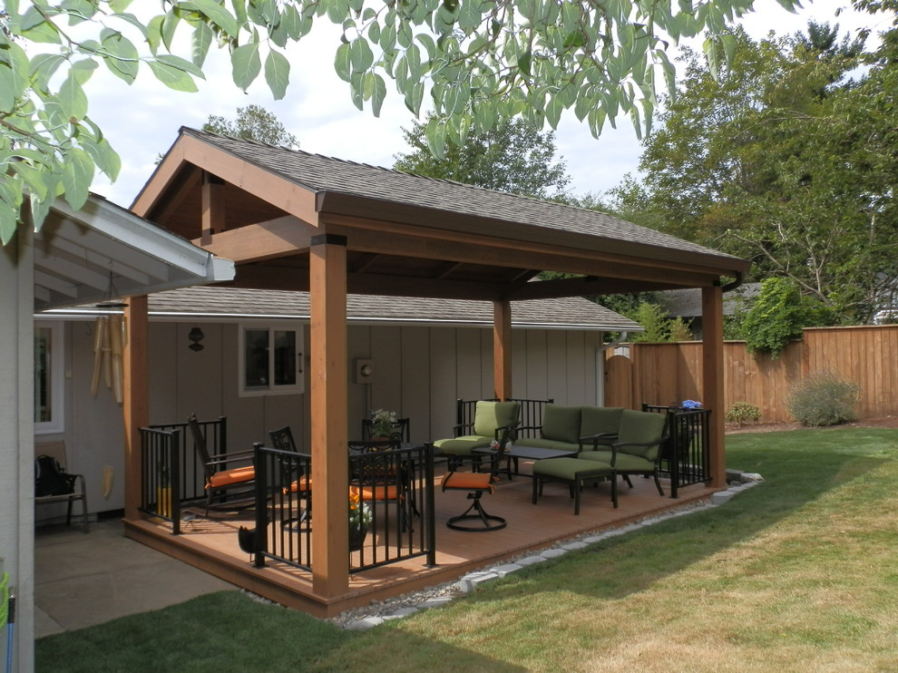 Design ideas for a small country backyard patio in Portland with decking and a roof extension.