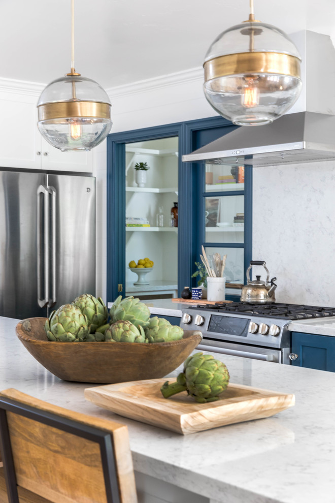 Inspiration for a large transitional eat-in kitchen in Sacramento with an undermount sink, shaker cabinets, blue cabinets, quartzite benchtops, stone slab splashback, stainless steel appliances, medium hardwood floors, with island and brown floor.