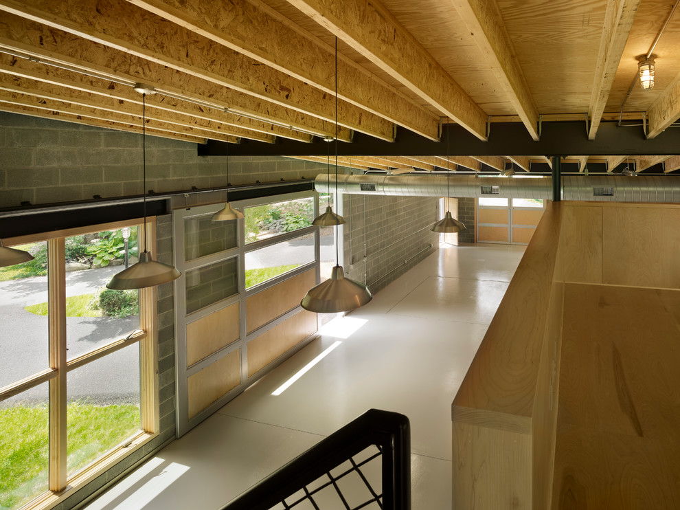 Garage workshop - mid-sized contemporary three-car garage workshop idea in Philadelphia