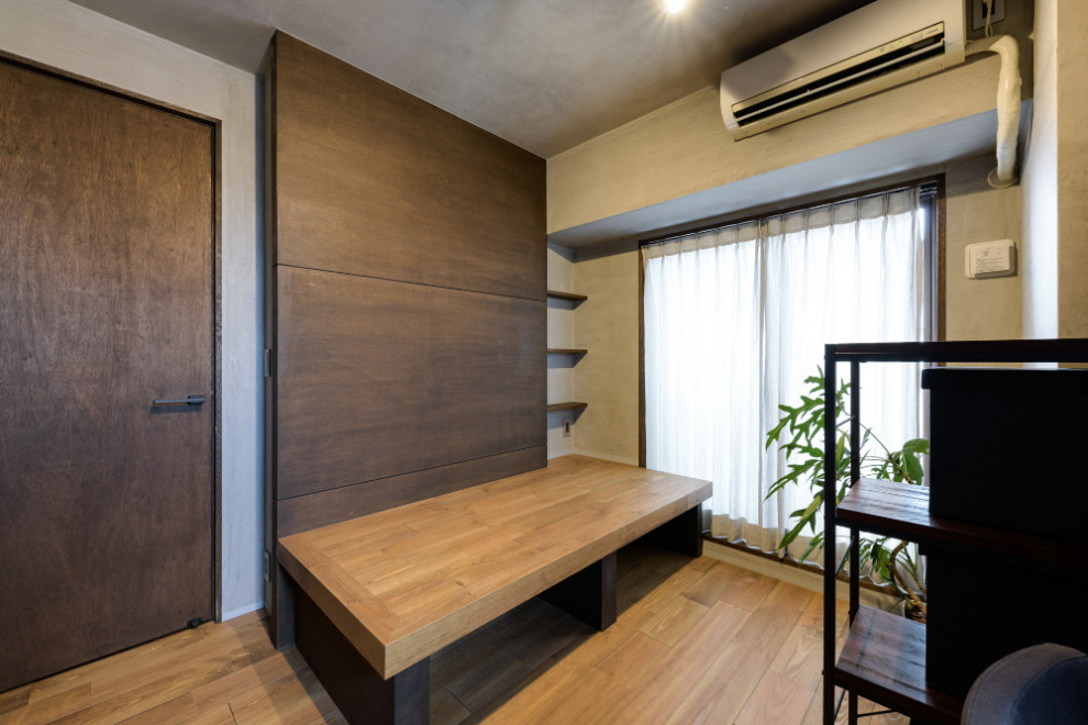 Bedroom - zen master light wood floor and beige floor bedroom idea in Other with gray walls