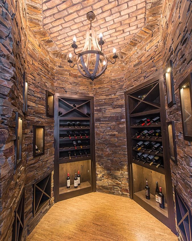 Example of a huge mountain style wine cellar design in Seattle