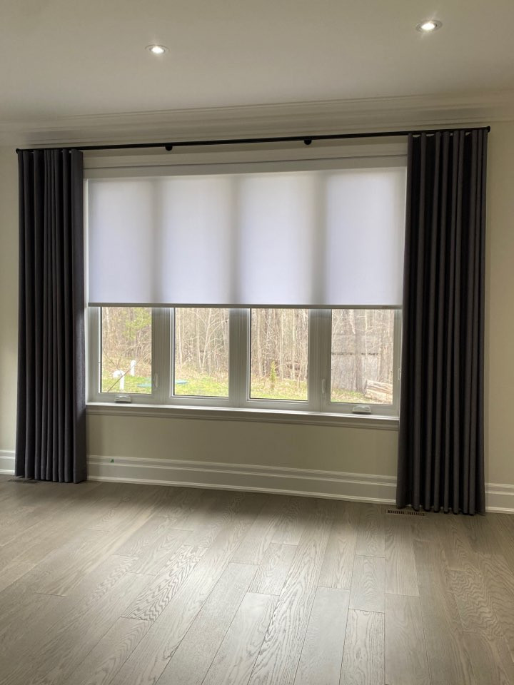 Mid-sized modern open concept family room in Toronto with beige walls, medium hardwood floors and brown floor.